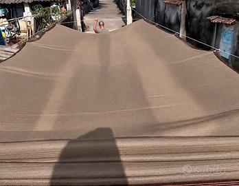 Telone onbreggiante  con occhielli 
