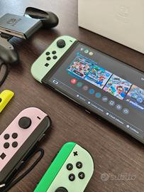 Nintendo Switch Oled e 4 Joycon