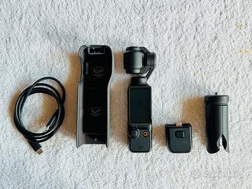 DJI Osmo Pocket 3 + custodia + mini-treppiede
