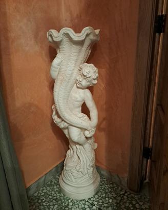 splendida statua con portapiante