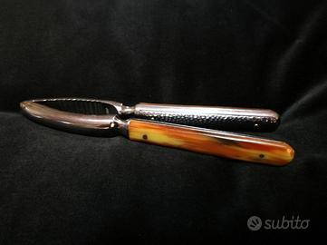 Schiaccianoci raro vintage in acciaio e corno