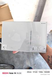) Geberit, Piastra di azionamento per cassette di