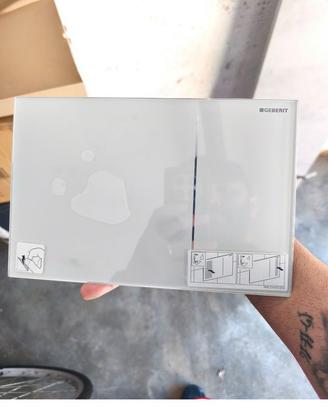 ) Geberit, Piastra di azionamento per cassette di