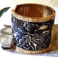Nuovo bracciale a manetta placcato in oro giallo
