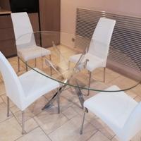 tavolo in cristallo ellittico piu 4 sedie in pelle