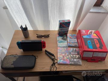 Nintendo Switch OLED + 4 giochi + custodia
