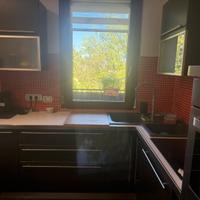Cucina ad angolo completa di elettrodomestici