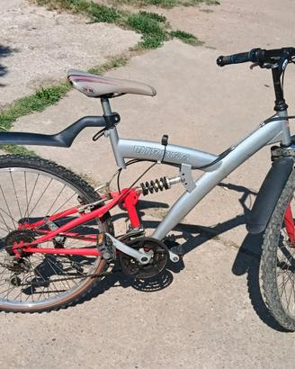 Mountain bike Mirage bi-ammortizzata da rivedere