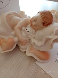 scultura Giuseppe Armani  "bambino che dorme"