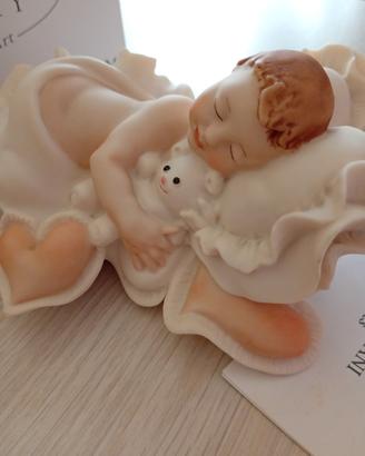 scultura Giuseppe Armani  "bambino che dorme"
