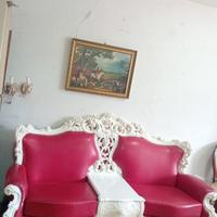 Divano barocco in pelle