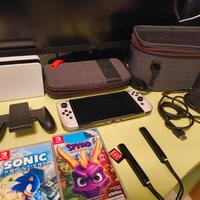 Nintendo switch OLED + giochi (leggi descrizione)
