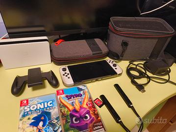 Nintendo switch OLED + giochi (leggi descrizione)