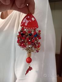 ciondolo artigianale a forma di pesce 