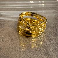 Anello intrecciato color oro in argento