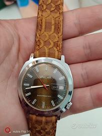 Orologio UNICAR Vintage con DATE SHOCKRESISTANT 