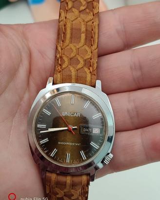 Orologio UNICAR Vintage con DATE SHOCKRESISTANT 