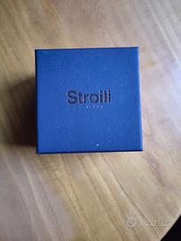 Scatola stroili oro viola con scritta rosa metalli