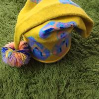 Cappello con pon pon