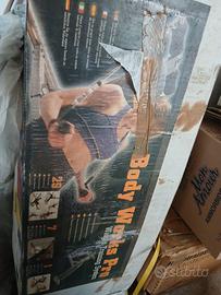 Panca e pesi per allenamento a casa