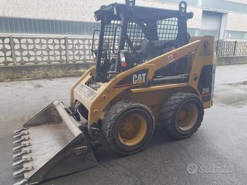 MINIPALA CATERPILLAR 216 + accessori