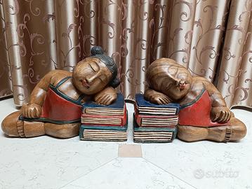 Statue bambino e donna Buddha in legno Thailand