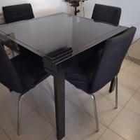 Tavolo in Vetro + 4 Sedie Ecopelle colore nero