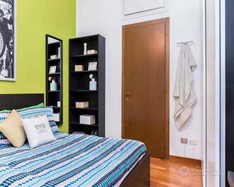 Stanza in appartamento di 96 m² a Milano