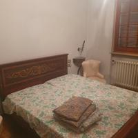 camera da letto con armadio intarsiato