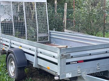 Carrello porta mezzi con sponda trasformabile