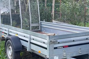 Carrello porta mezzi con sponda trasformabile