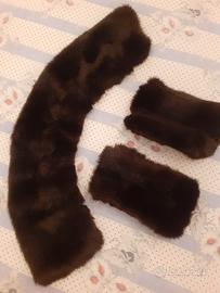 Collo e manicotti in pelliccia 
