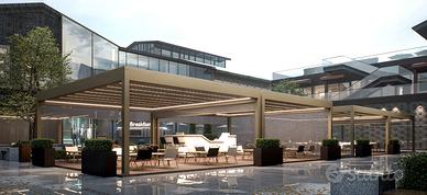 Pergola in alluminio con tetto retraibile in PVC