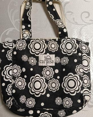 borsa donna carpisa nera con fiori bianchi