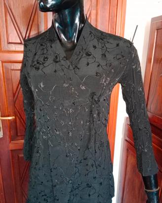 completo blusa e pantaloni