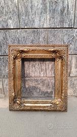 Cornice barocca dorata