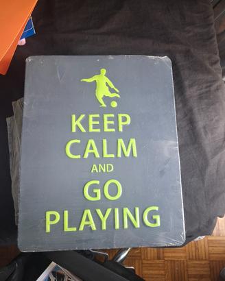 poster in metallo con frase motivazionale 