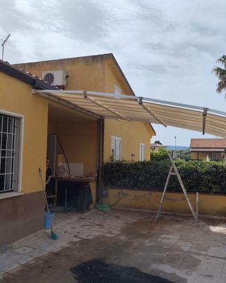Tenda da sole retrattile con piedi