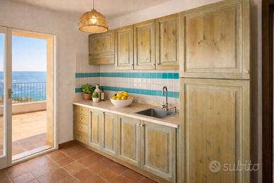 cucina completa di piccola credenza