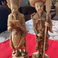 Coppia statuette orientali in pasta di resina Vint