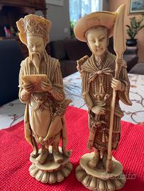 Coppia statuette orientali in pasta di resina Vint