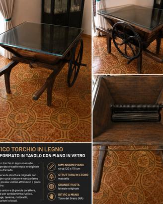 Antico torchio in legno trasformato in tavolo con 