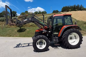 New Holland TS 100 con caricatore frontale Sigma4