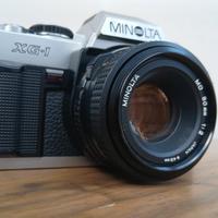 MINOLTA XG - 1  CON 50 MM 1: 2 BLOCCATA .