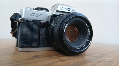 MINOLTA XG - 1  CON 50 MM 1: 2 BLOCCATA .