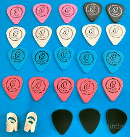 25 PLETTRI PER CHITARRA + PORTAPLETTRI PICKBOY