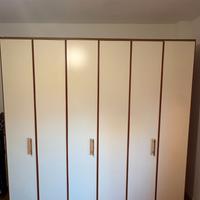 Cucina, stanza da letto e lavatrice