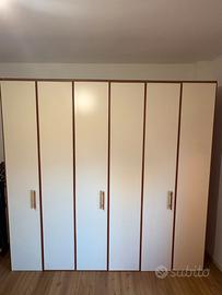 Cucina, stanza da letto e lavatrice