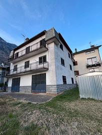 Casa tre piani ( 2 appartamenti/garage/4 cantine)