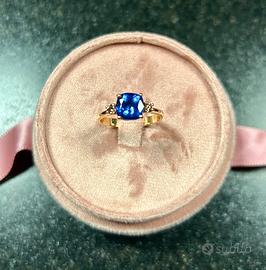 Anello oro rosa 18kt con tanzanite e diamanti